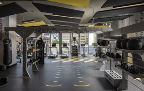 Miami apartment for rent - A gym with a variety of equipment including treadmills, weights and exercise machines.