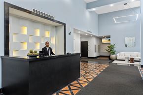 Jersey City apartment for rent - A reception area with a black and white color scheme.