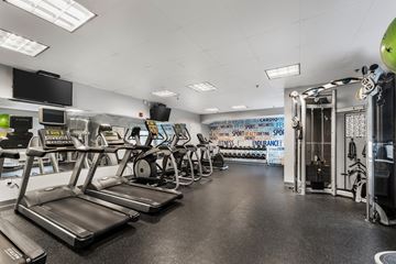 Jersey City apartment for rent - A gym with treadmills and other exercise equipment.