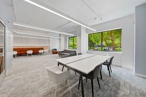 Jersey City apartment for rent - A conference room with a long table and chairs.