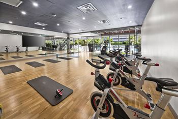 Fitness center with yoga and spin rooms