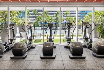 Fitness center with yoga and spin rooms