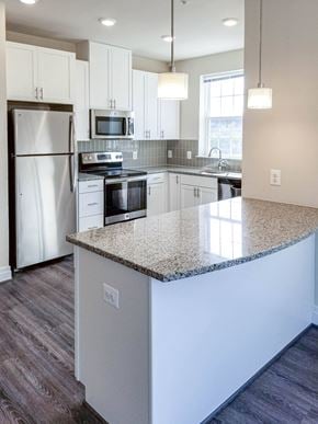 Frederick apartment for rent - Modern kitchen with Island at The Village Center Apartments At Wormans Mill*, Frederick, MD