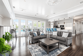 Canal Winchester apartment for rent - A living room with a grey sofa, a grey coffee table, and a white ceiling.