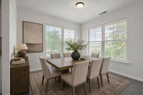 Canal Winchester apartment for rent - A dining room with a table and chairs.