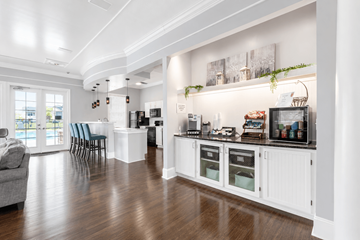 Canal Winchester apartment for rent - A kitchen with a white cabinet and a grey sofa.