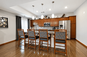 West Chanhassen apartment for rent - A kitchen with a table and chairs.