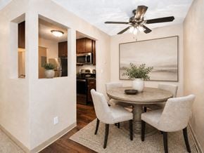 Eagan apartment for rent - A dining room with a round table and chairs.
