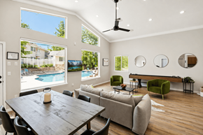 Cedar City apartment for rent - A modern living room with a pool view.