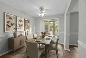 Jonesboro townhouse for rent - A dining room with a table set for four.