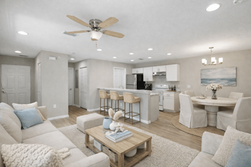Naples apartment for rent - A living room with a white couch and a coffee table.