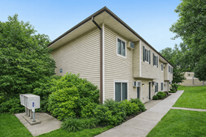 Chaska apartment for rent - A residential building with a mailbox in front.
