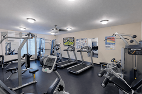 Sartell apartment for rent - Fitness center with cardio and strength equipment at The Ponds at Heritage Place Apartments, Sartell, 56377