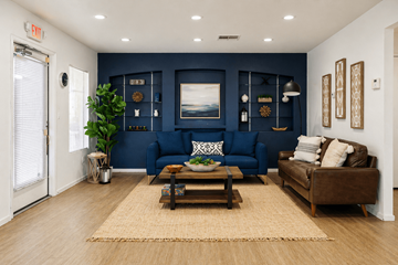 Henderson apartment for rent - A living room with a blue couch and a brown couch.