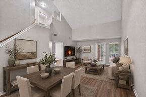 Dallas townhouse for rent - A modern dining room with a wooden table and chairs.
