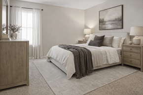 Marion apartment for rent - A bedroom with a large bed, a nightstand, and a dresser.