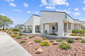 Henderson apartment for rent - A modern building with a landscaped front yard.