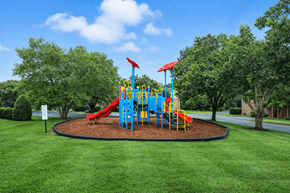 Mooresville apartment for rent - A playground with a blue and yellow structure and a red slide.