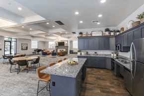 South Jordan apartment for rent - Clubhouse kitchen with granite island and bar seating at The Beckstead Apartments, South Jordan, UT 84095
