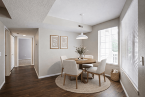 West Haven apartment for rent - A dining room with a round table and chairs at Haven Pointe Apartments, West Haven, UT, 84401