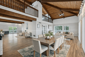 Stone Mountain apartment for rent - A modern dining room with a wooden table and chairs.