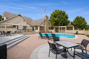 Kansas City apartment for rent - A house with a pool and a flag on the roof.