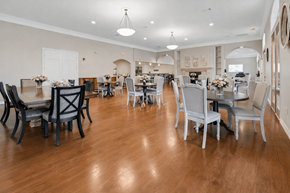 Katy apartment for rent - A large dining room with a wooden floor and white walls.