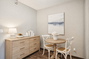 Burnsville apartment for rent - A dining area with a wooden table and chairs.