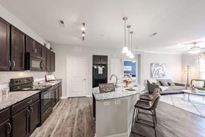 Louisville apartment for rent - an open kitchen and living room with a large counter top at Hurstbourne Estates Apartments, Louisville, Kentucky