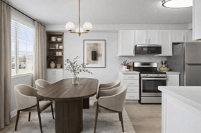 Layton apartment for rent - A modern kitchen with a dining table and chairs.
