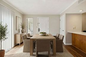 Kansas City apartment for rent - A dining room with a table and chairs.