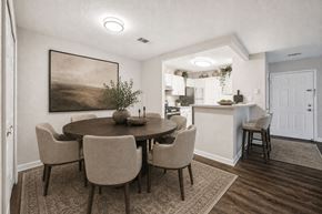 Sterling Heights apartment for rent - A dining room with a round table and chairs.