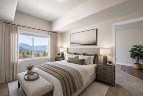 Layton apartment for rent - Master bedroom with mountain views and neutral decor at The Ellison Apartments, Layton, Utah