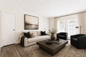 Jonesboro apartment for rent - A living room with a couch, chair, and coffee table.