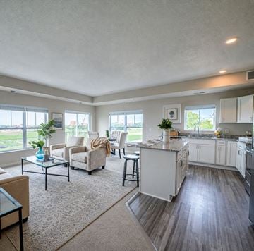 Falcon Heights apartment for rent - A well-lit, spacious kitchen and living room with a dining area.