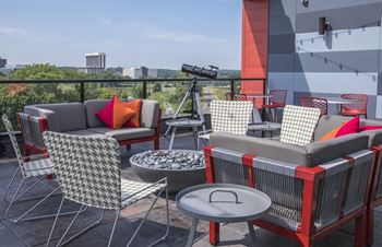 Hello apartments sky deck with fire pit lounge