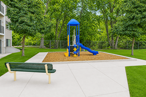 Ogden apartment for rent - A playground with a blue tower and yellow slide.