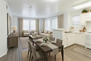 West Valley City apartment for rent - A modern kitchen and dining room with a wooden table set for two.