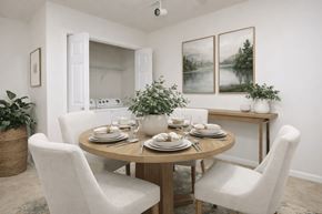 Stone Mountain apartment for rent - A dining room with a round table set for four.