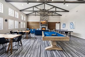 Los Alamos apartment for rent - A room with a pool table and a fireplace.
