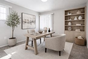Santa Fe apartment for rent - Home office with wooden desk and built in shelving at Vista Linda Apartments, Santa Fe, New Mexico