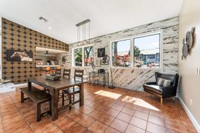 Daytona Beach apartment for rent - A dining room with a wooden table and chairs. at Epic Apartments , Florida, 32114