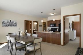 Andover apartment for rent - A dining room with a table set for six.