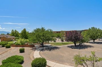 Rio Rancho apartment for rent - A sunny day in a courtyard with a clear blue sky.