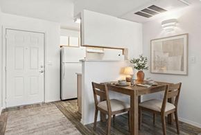 Rio Rancho apartment for rent - A small dining room with a table set for two.