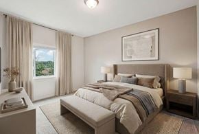 Vadnais Heights apartment for rent - A bedroom with a large bed and a window with curtains at Aster Meadow, Vadnais Heights, MN, 55127