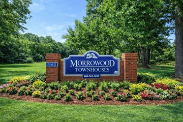 Morrow townhouse for rent - A sign for Morrowood Townhouses with a phone number on it.