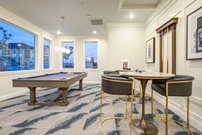 Denver apartment for rent - Game room with pool table and seating at Connect at First Creek Apartments, Denver