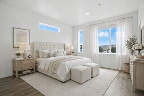 Reno townhouse for rent - Bright bedroom with neutral tones and large windows at Summit Ridge Townhomes Apartments, Reno