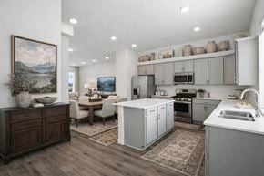 Reno townhouse for rent - Open concept kitchen and living area with island at Summit Ridge Townhomes Apartments, Nevada